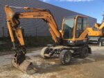 Pelle sur pneus Hyundai ROBEX 55W-9 2012 – 5,5T – 5050h – Occasion