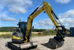 Mini-pelle d’occasion New Holland E50B SR (2012) – 5,1T + Remorque